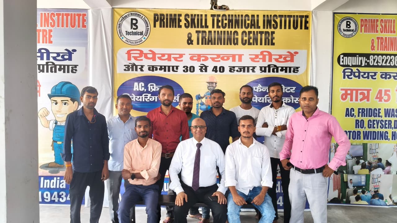 Students learning machine repair